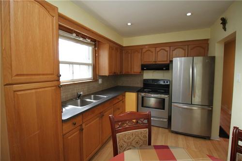 Kitchen - 323 Tragina Avenue N, Hamilton, ON - Indoor Photo Showing Kitchen With Double Sink