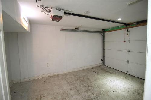 Garage with inside entry to basement - 323 Tragina Avenue N, Hamilton, ON - Indoor Photo Showing Garage