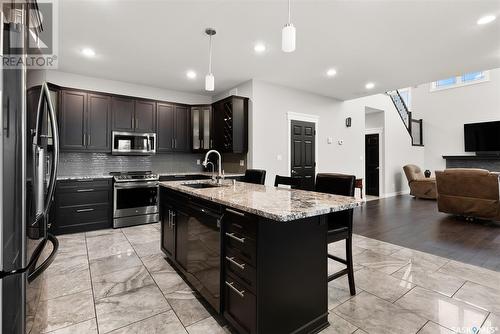22 Aspen Village Drive, Emerald Park, SK - Indoor Photo Showing Kitchen With Upgraded Kitchen