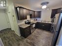 A & B 628 Saskatchewan Avenue, Kerrobert, SK  - Indoor Photo Showing Kitchen With Double Sink 