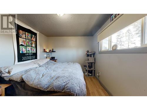 4737 Sussnee Road, 108 Mile Ranch, BC - Indoor Photo Showing Bedroom