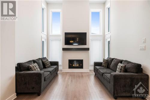 968 Acoustic Way, Ottawa, ON - Indoor Photo Showing Living Room With Fireplace