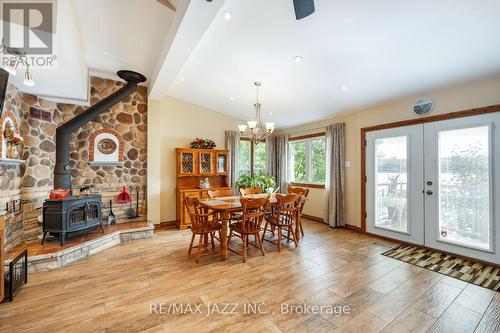 825 Southview Dr, Otonabee-South Monaghan, ON - Indoor Photo Showing Dining Room With Fireplace