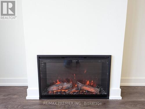 #602 -7 Steckley House Lane, Richmond Hill, ON - Indoor With Fireplace
