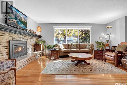 4230 Garnet Street, Regina, SK - Indoor Photo Showing Living Room With Fireplace