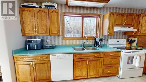 13292 Fell Road, Fort St. John, BC - Indoor Photo Showing Kitchen With Double Sink