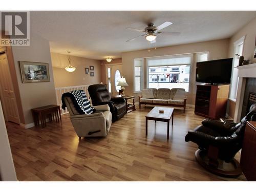 8458 Sparrow Road, Prince George, BC - Indoor Photo Showing Living Room With Fireplace