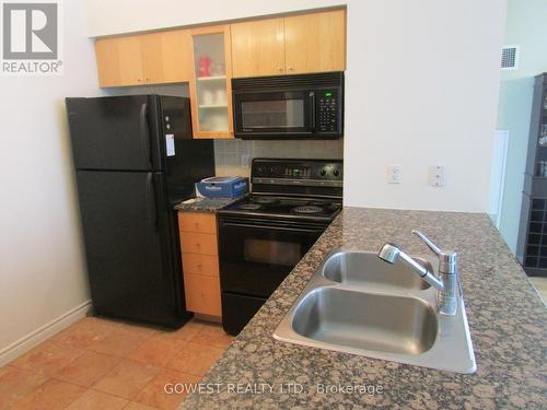 310 - 410 Queens Quay W, Toronto, ON - Indoor Photo Showing Kitchen With Double Sink