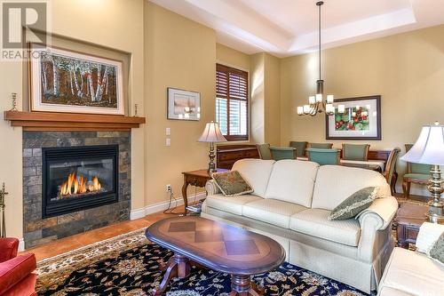 4109 Gallaghers Boulevard S, Kelowna, BC - Indoor Photo Showing Living Room With Fireplace