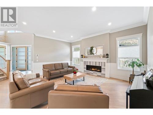 2699 Ridgemount Drive, West Kelowna, BC - Indoor Photo Showing Living Room With Fireplace