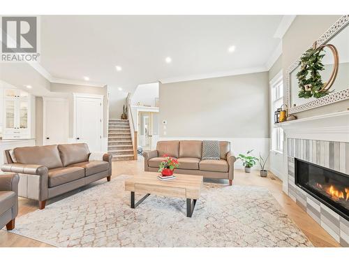 2699 Ridgemount Drive, West Kelowna, BC - Indoor Photo Showing Living Room With Fireplace