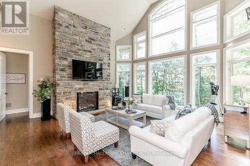 1 Pierce Crt, Springwater, ON - Indoor Photo Showing Living Room With Fireplace