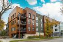 303 958 Mcmillan Avenue, Winnipeg, MB  - Outdoor With Balcony With Facade 