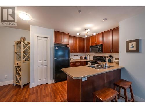 246 Hastings Avenue Unit# 207, Penticton, BC - Indoor Photo Showing Kitchen With Double Sink