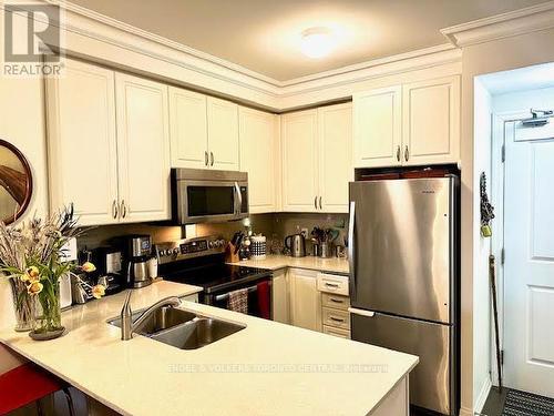 #214 -3563 Lake Shore Blvd W, Toronto, ON - Indoor Photo Showing Kitchen With Double Sink
