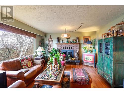 3812 Albrecht Road, Naramata, BC - Indoor Photo Showing Living Room With Fireplace