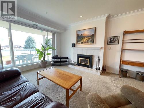 7801 Spartan Drive Unit# 215, Osoyoos, BC - Indoor Photo Showing Living Room With Fireplace