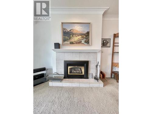 7801 Spartan Drive Unit# 215, Osoyoos, BC - Indoor Photo Showing Living Room With Fireplace