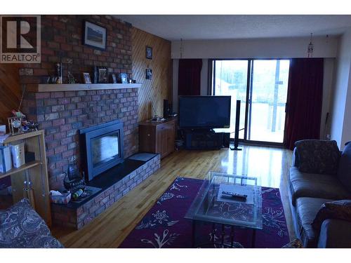 784 Funn Street, Quesnel, BC - Indoor Photo Showing Living Room With Fireplace