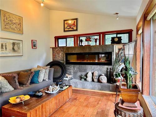 1498 Carrington Bay Rd, Cortes Island, BC - Indoor Photo Showing Living Room With Fireplace