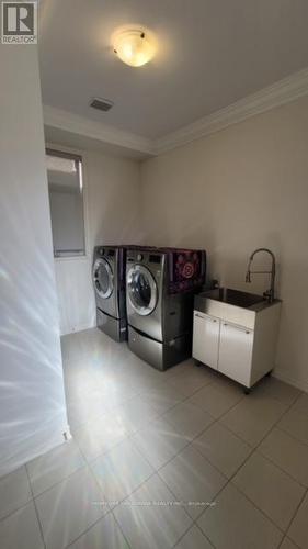 49 Redmond Crescent, Springwater, ON - Indoor Photo Showing Laundry Room