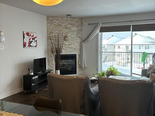 Autre - 4845 Rue Jacques-Plante, Laval (Chomedey), QC - Indoor Photo Showing Living Room With Fireplace