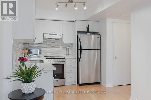 #159 -4975 Southampton Dr, Mississauga, ON - Indoor Photo Showing Kitchen With Stainless Steel Kitchen