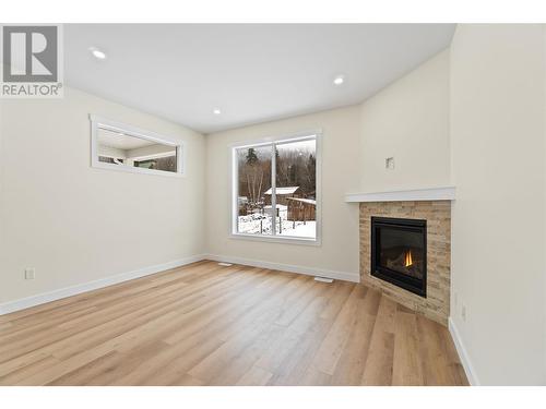 1840 10 Street Sw Unit# 24, Salmon Arm, BC - Indoor Photo Showing Living Room With Fireplace