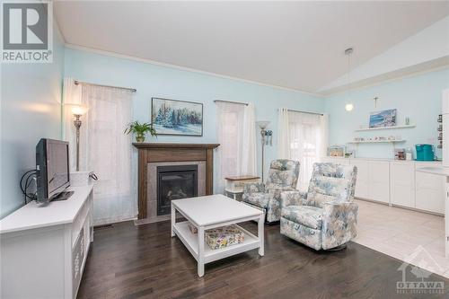 265 Opale Street, Rockland, ON - Indoor Photo Showing Living Room With Fireplace