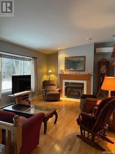 30 Clover Lane, Penobsquis, NB - Indoor Photo Showing Living Room With Fireplace