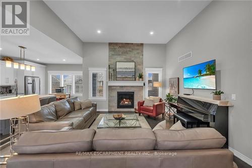 11 Taishan Place, Norfolk, ON - Indoor Photo Showing Living Room With Fireplace