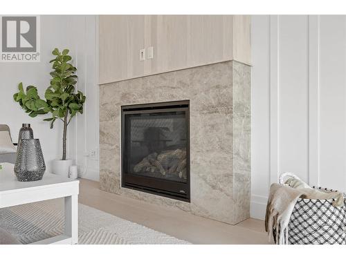 4213 Russo Street, Kelowna, BC - Indoor Photo Showing Other Room With Fireplace
