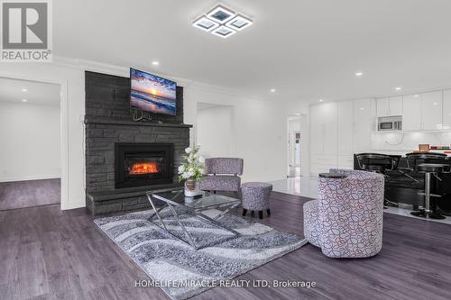 3035 Niagara Parkway, Fort Erie, ON - Indoor Photo Showing Living Room With Fireplace