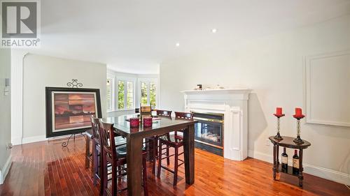 40-44 Summit Drive, Paradise, NL - Indoor Photo Showing Dining Room With Fireplace