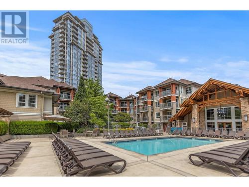 1093 Sunset Drive Unit# 310, Kelowna, BC - Outdoor With In Ground Pool With Facade