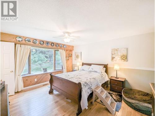 4827 Kitwanga Drive, 108 Mile Ranch, BC - Indoor Photo Showing Bedroom