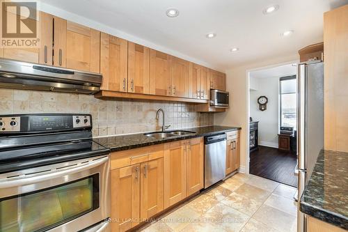 #710 -2045 Lake Shore Blvd W, Toronto, ON - Indoor Photo Showing Kitchen With Double Sink