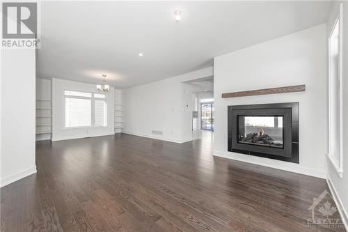 780 Ovation Grove, Ottawa, ON - Indoor Photo Showing Living Room With Fireplace