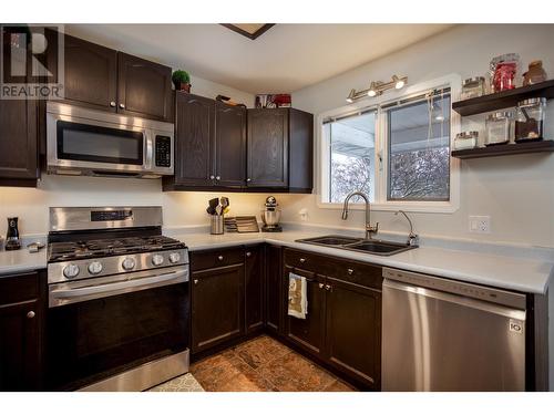 1877 Maple Street, Lumby, BC - Indoor Photo Showing Kitchen With Double Sink