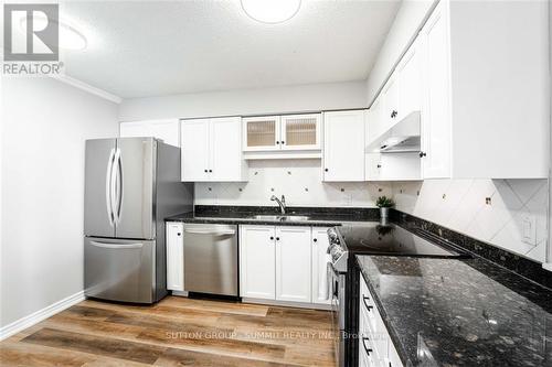 #505 -5280 Lakeshore Rd, Burlington, ON - Indoor Photo Showing Kitchen With Double Sink