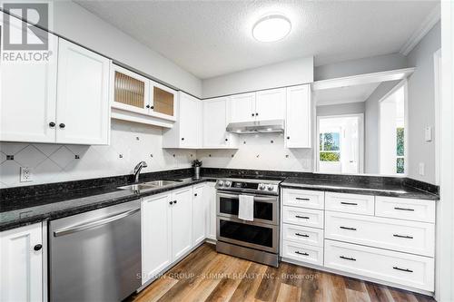 505 - 5280 Lakeshore Road, Burlington, ON - Indoor Photo Showing Kitchen With Double Sink