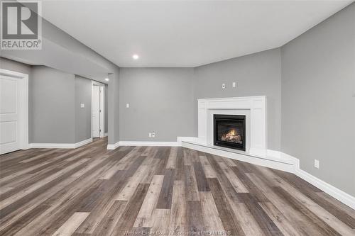 45 Belleview, Kingsville, ON - Indoor Photo Showing Living Room With Fireplace
