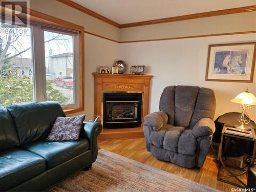721 Toothill Street, Regina, SK - Indoor Photo Showing Living Room With Fireplace