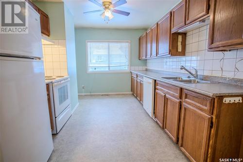 972 106Th Street, North Battleford, SK - Indoor Photo Showing Kitchen With Double Sink