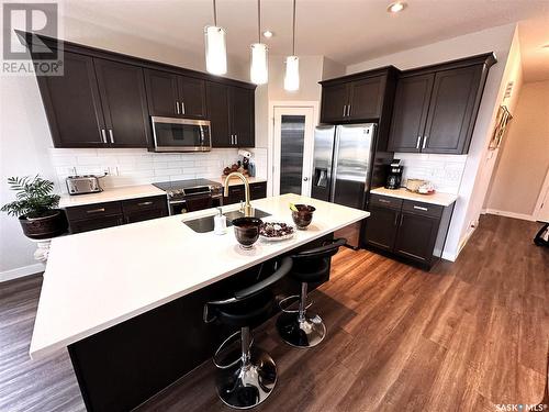 8109 Barley Crescent, Regina, SK - Indoor Photo Showing Kitchen With Double Sink With Upgraded Kitchen