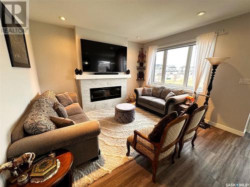 8109 Barley Crescent, Regina, SK - Indoor Photo Showing Living Room With Fireplace