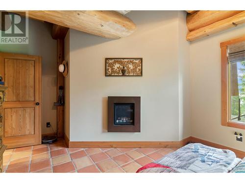 1897 Blind Bay Road, Blind Bay, BC - Indoor Photo Showing Bedroom With Fireplace