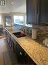 10 Van Allen Avenue Suite 803 Unit# 803, Chatham, ON  - Indoor Photo Showing Kitchen With Double Sink 