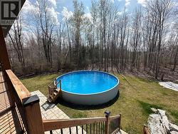 Above ground pool off of covered porch - 