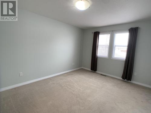 A 4415 Heritage Crescent, Fort Nelson, BC - Indoor Photo Showing Other Room